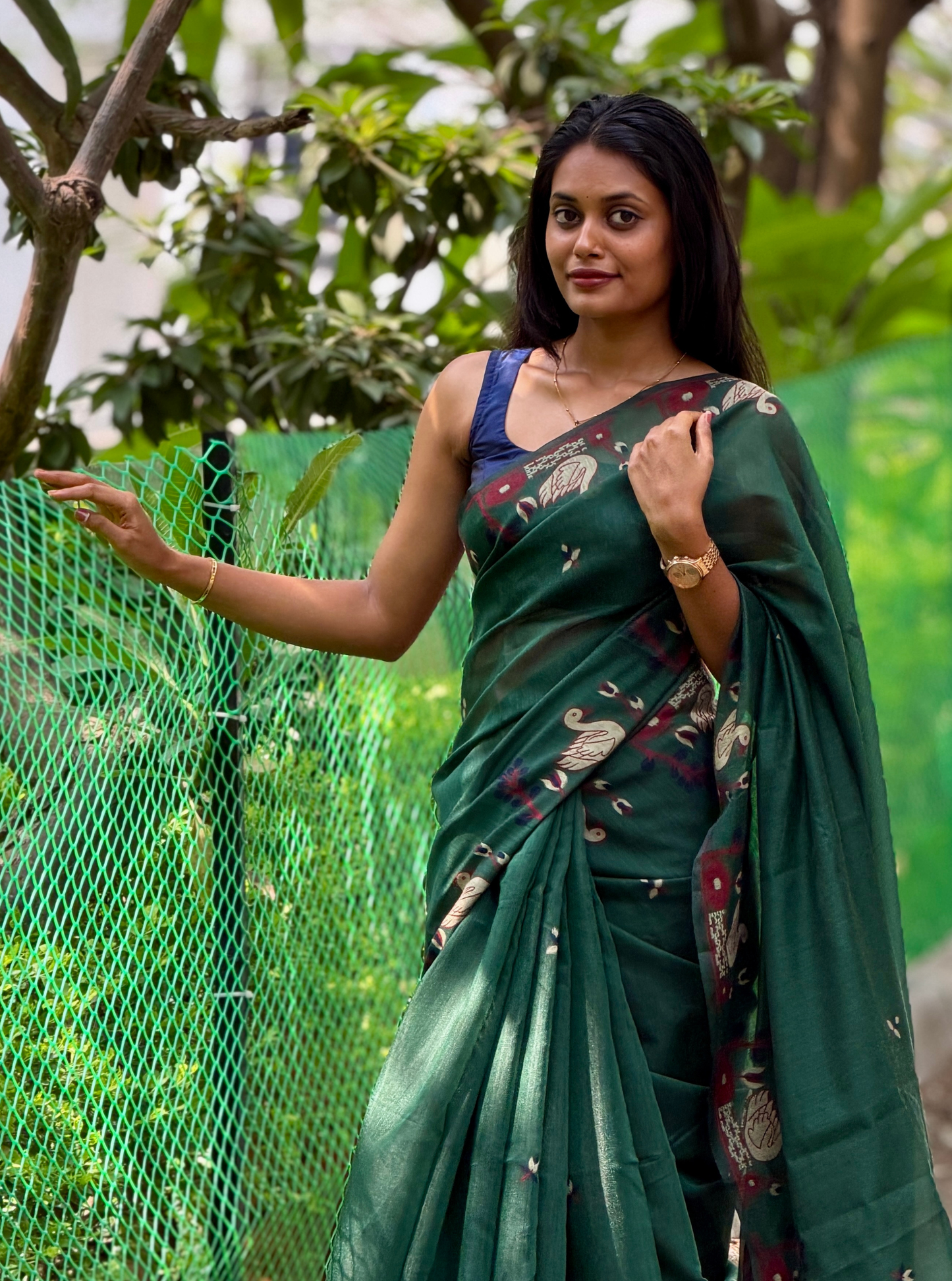 Elegant Forest Green Cotton Designer Saree with Artistic Border