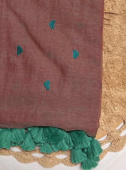 Subtle Dusty Pink Mul Cotton Saree with Minimal Embroidery & Green Tassels