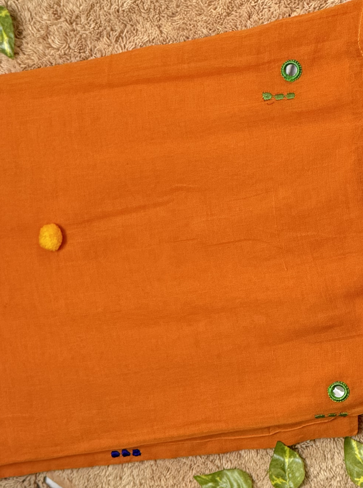 Sunset Orange Mul Cotton Saree with Green Tassels