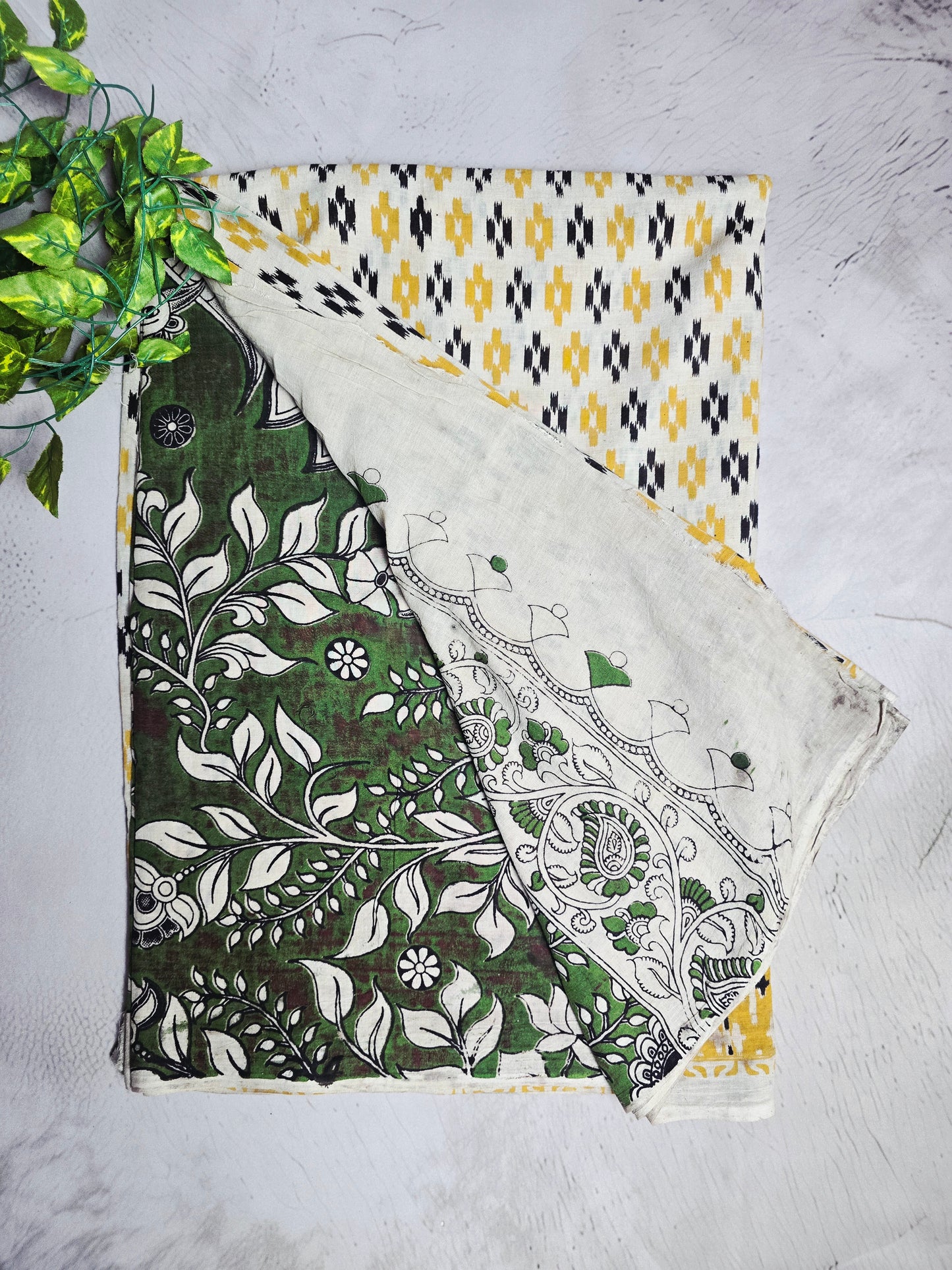 Mustard Yellow & Black Ikat Print Cotton Kalamkari Saree with Green Floral Pallu