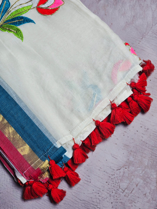 Ivory and Blue Mul Cotton Saree with Multicolour Floral Embroidery & Red Tassels