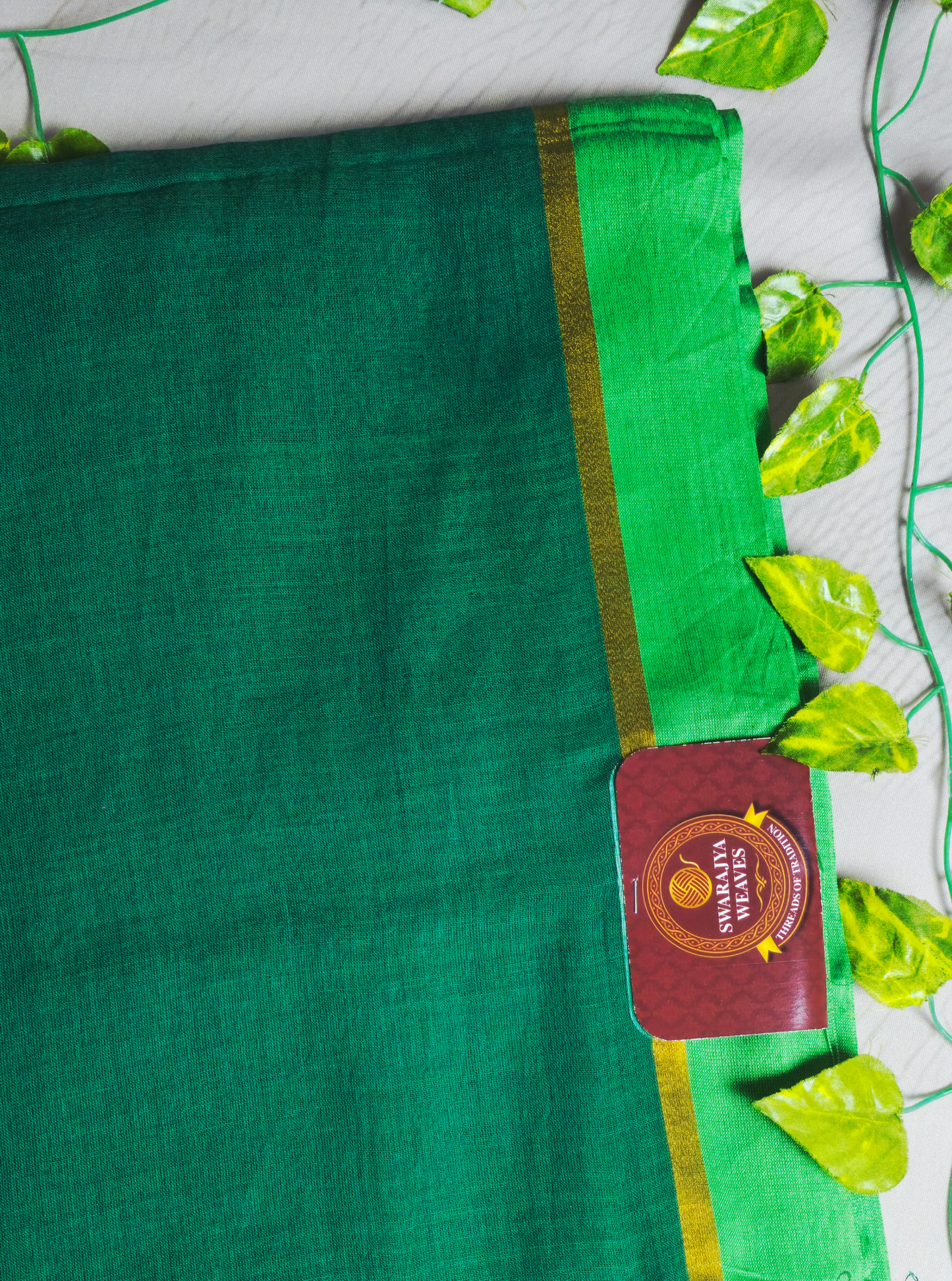 Elegant Green Mul Cotton Saree with Golden Border & Tassel Pallu