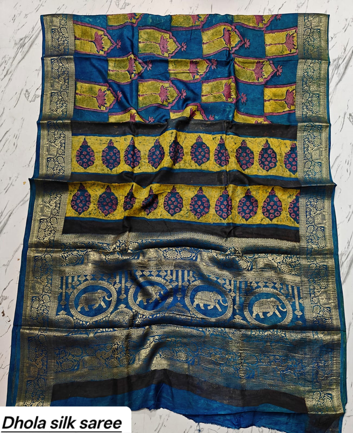 Teal blue and mustard Dola silk Ajrakh saree with ornate elephant motif pallu