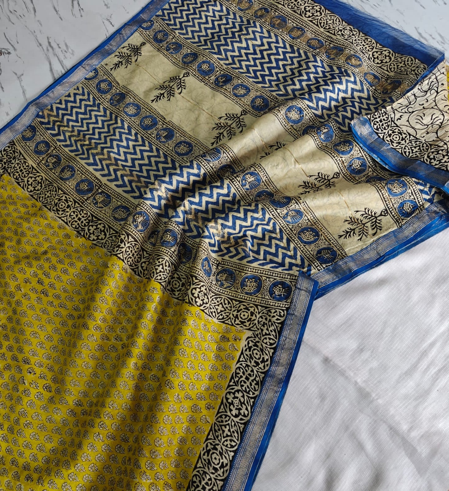 Mustard Yellow & Royal Blue Maheshwari Silk Saree with Blue & Cream Ajrakh Pallu & Black Printed Border