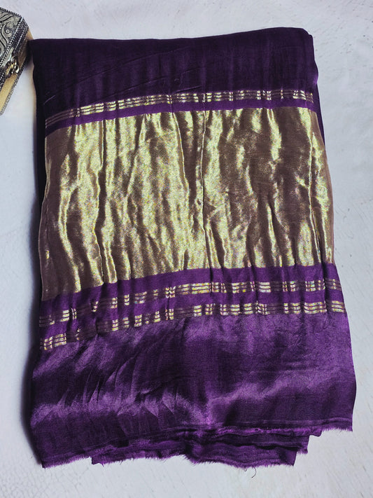 Deep emerald green Modal Silk saree with antique gold zari border and pallu