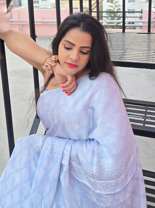 Pastel Blue Modal Silk Saree with White Prints – Soft Flow Luxury Drapes