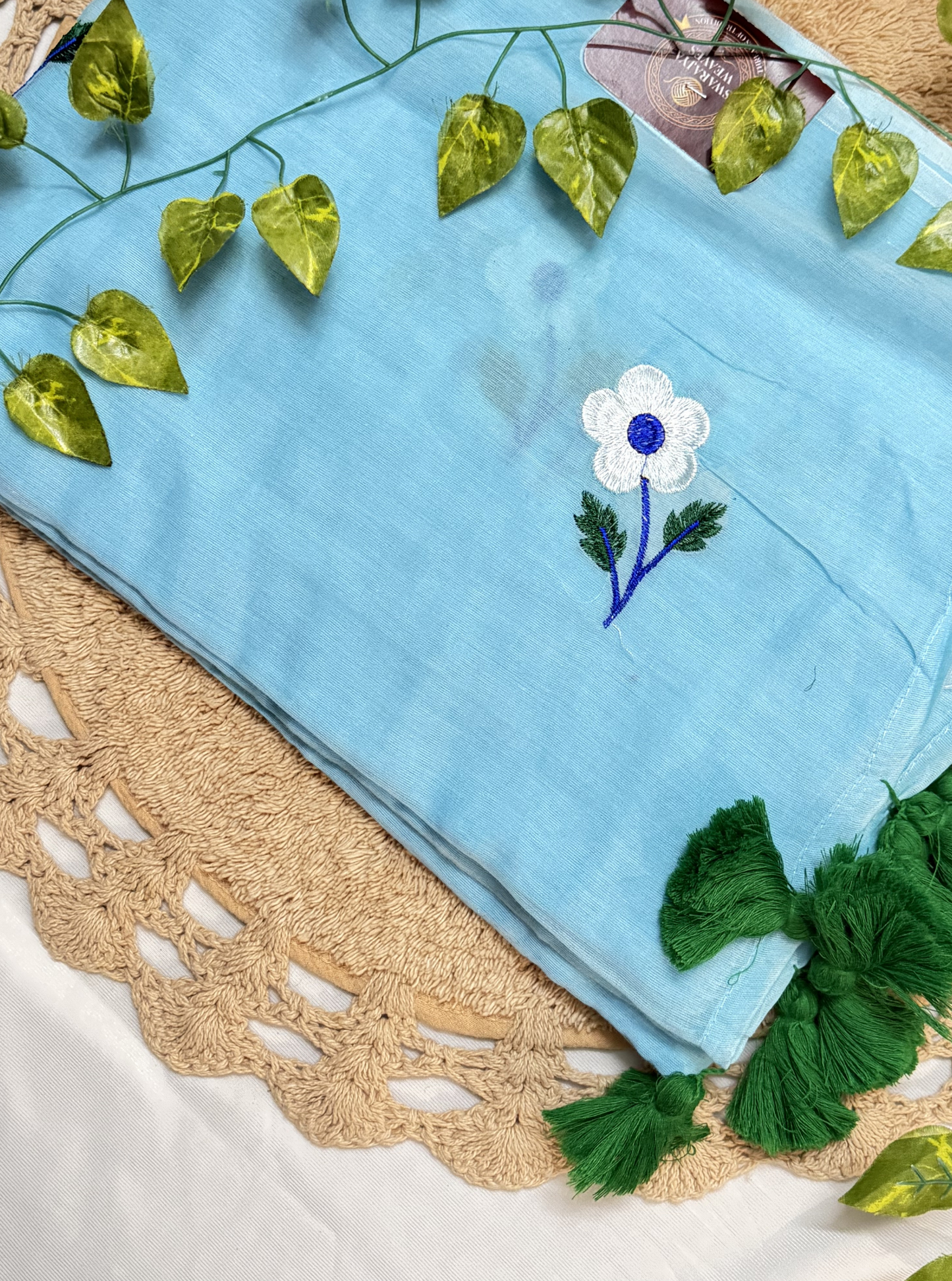Sky Blue Mul Cotton Saree with Floral Embroidery & Green Tassels