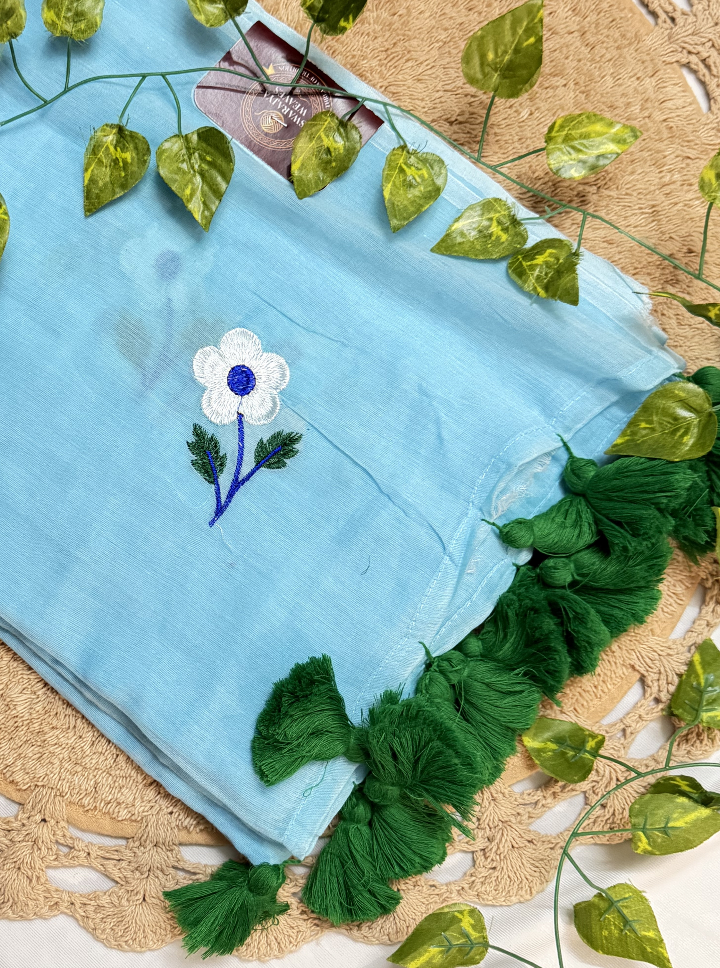 Sky Blue Mul Cotton Saree with Floral Embroidery & Green Tassels