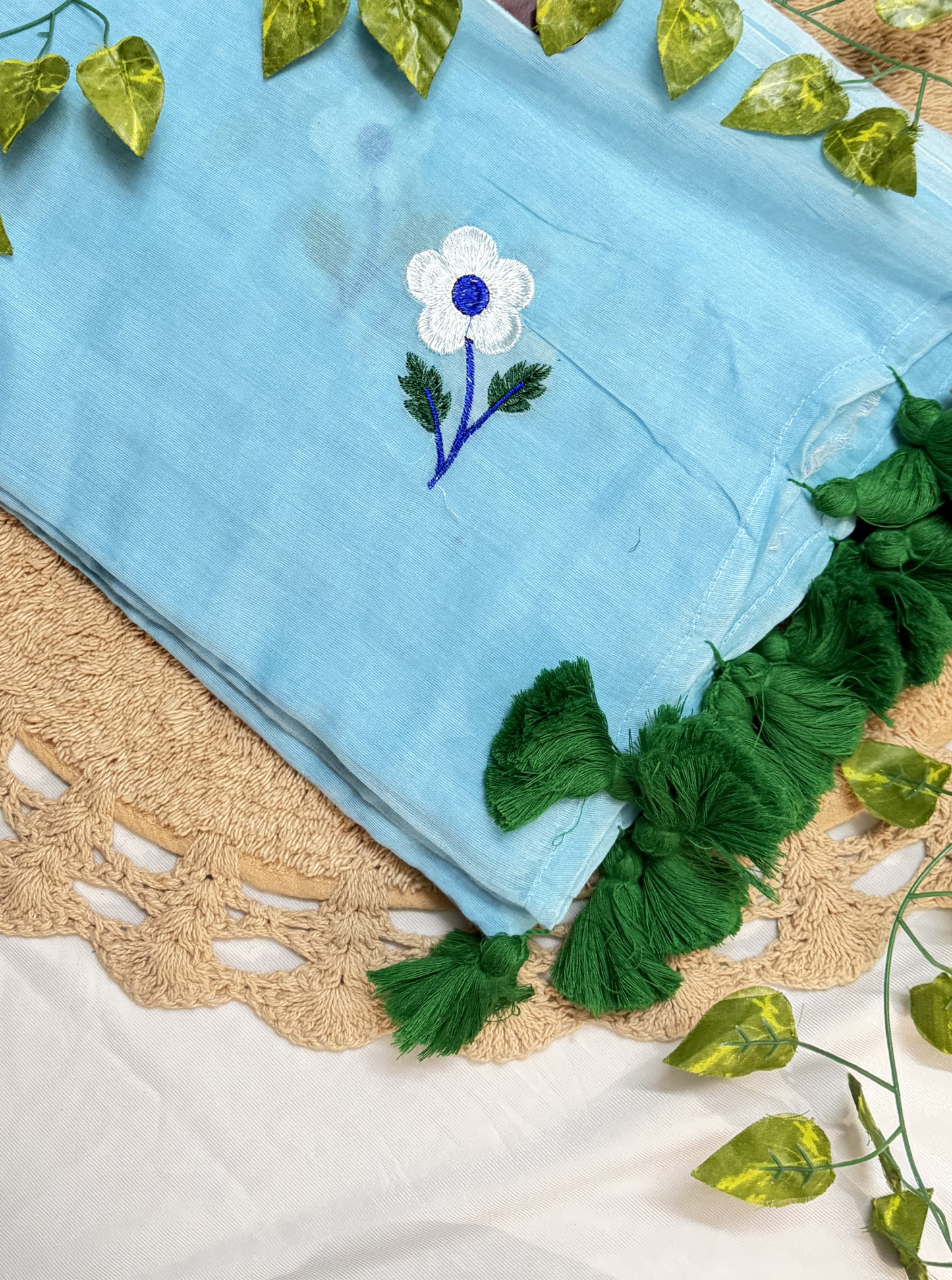 Sky Blue Mul Cotton Saree with Floral Embroidery & Green Tassels