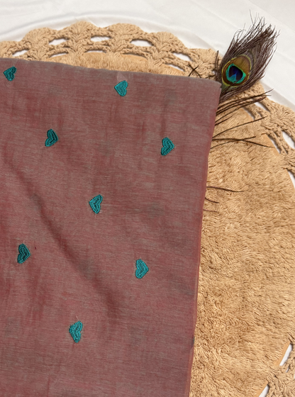 Subtle Dusty Pink Mul Cotton Saree with Minimal Embroidery & Green Tassels