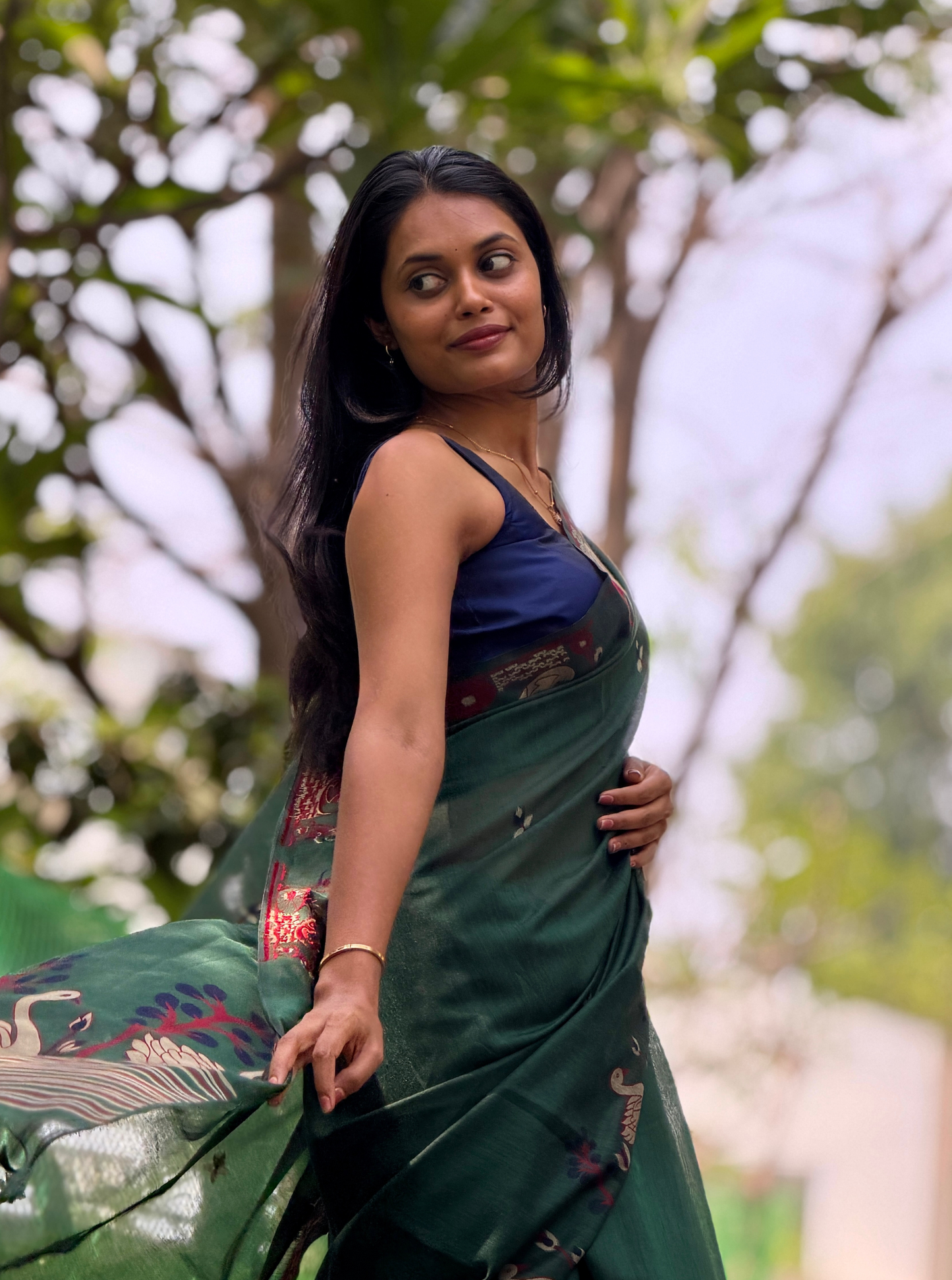 Elegant Forest Green Cotton Designer Saree with Artistic Border