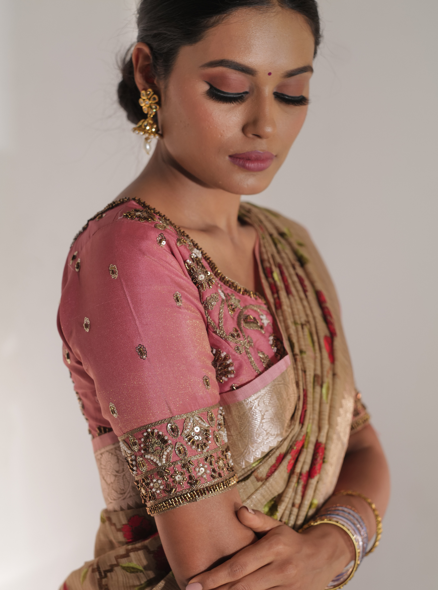 Beige Pink Matka Silk Tissue Saree with Floral Embroidery