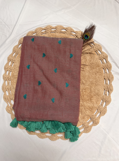 Subtle Dusty Pink Mul Cotton Saree with Minimal Embroidery & Green Tassels