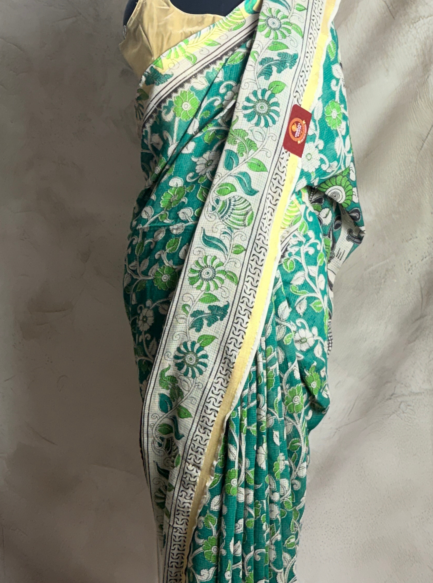 Emerald Green Kota Cotton Saree with Floral Vine Motifs & Ivory Border