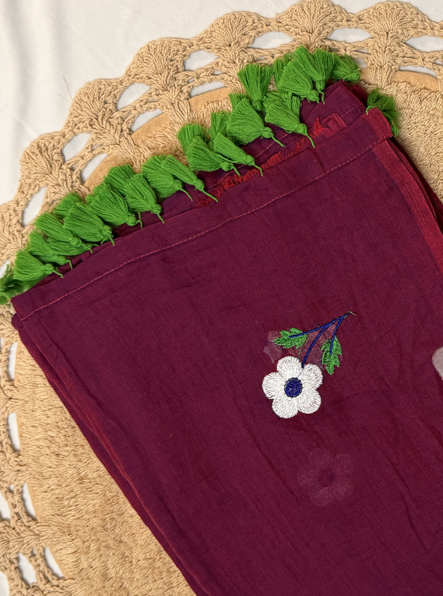 Wine Mul Cotton Saree with Floral Embroidery & Green Tassels