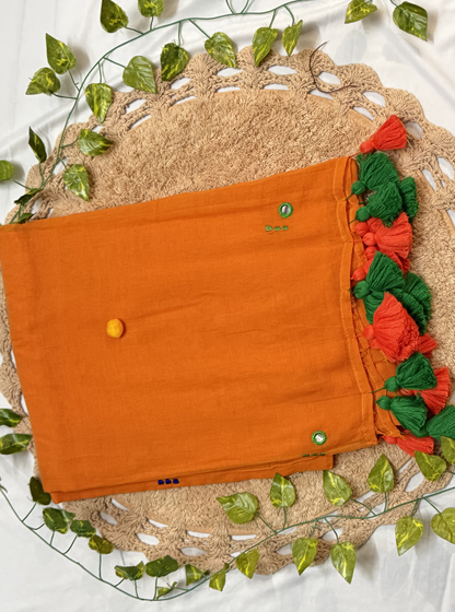 Sunset Orange Mul Cotton Saree with Green Tassels