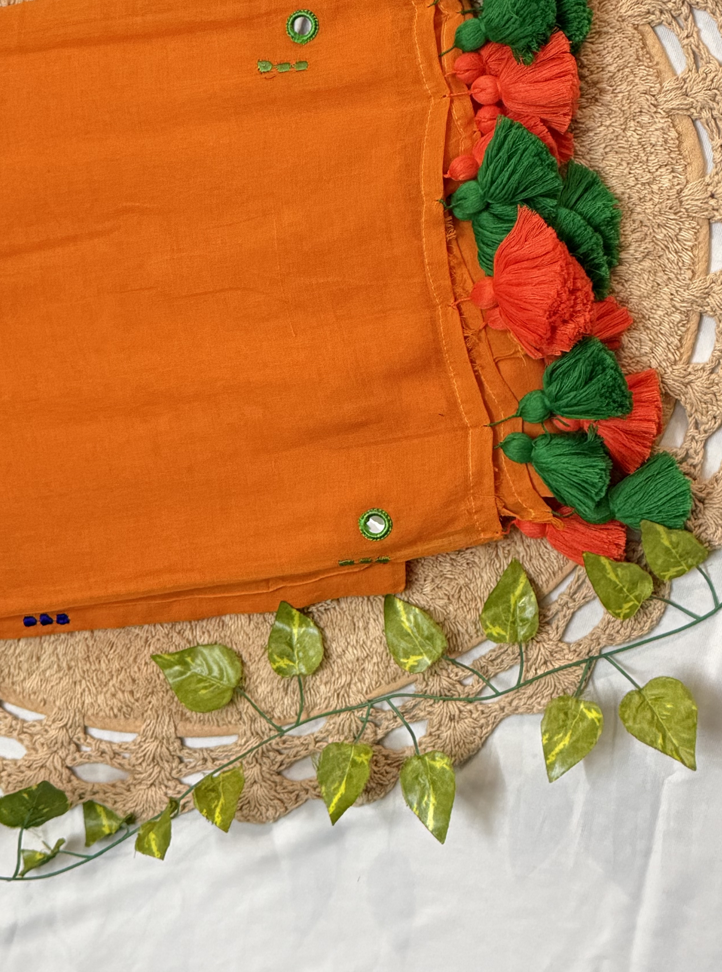 Sunset Orange Mul Cotton Saree with Green Tassels