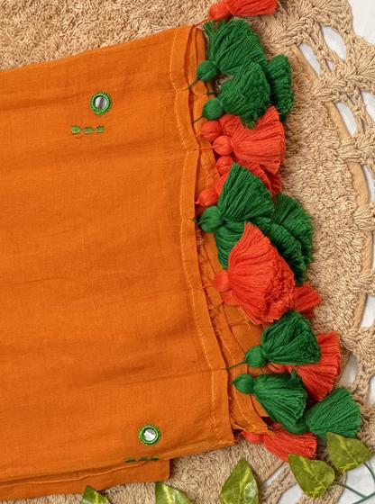 Sunset Orange Mul Cotton Saree with Green Tassels