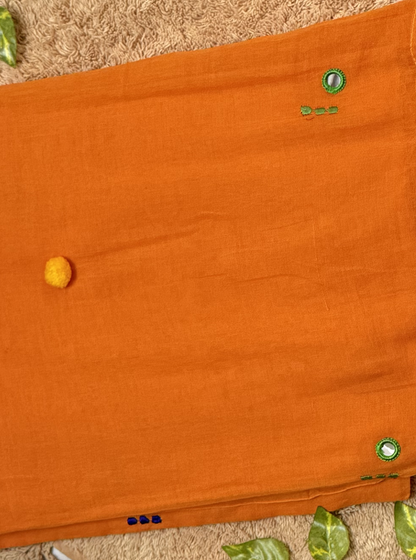 Sunset Orange Mul Cotton Saree with Green Tassels