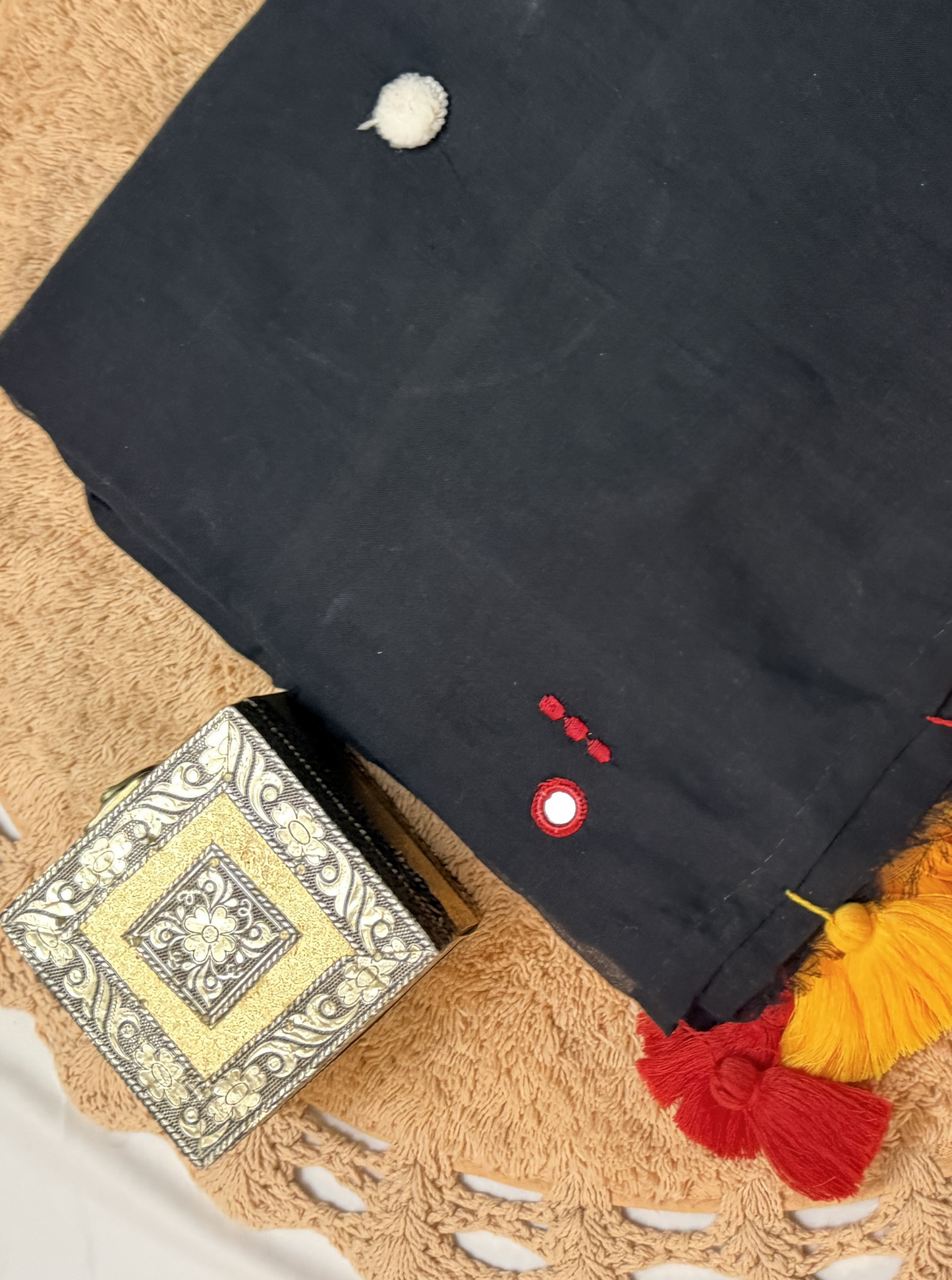 Midnight Black Mul Cotton Saree with Red & Yellow Tassels
