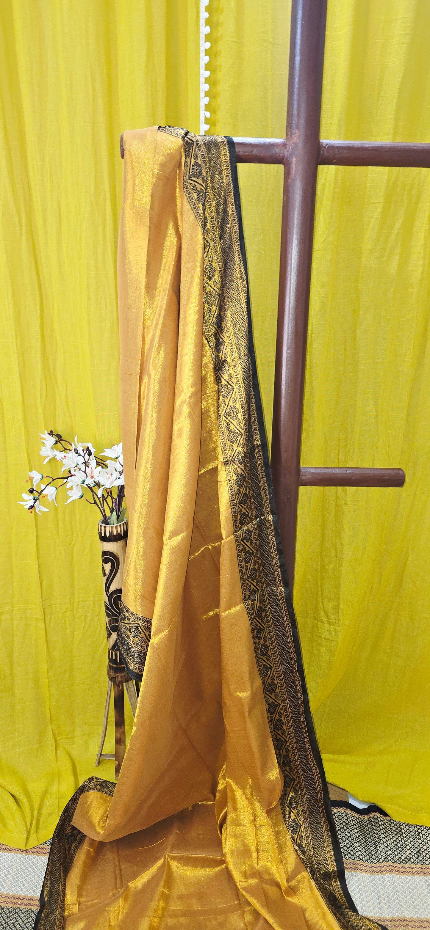 Stunning Yellow Tissue Cotton Saree with Border Design for Festive Wear