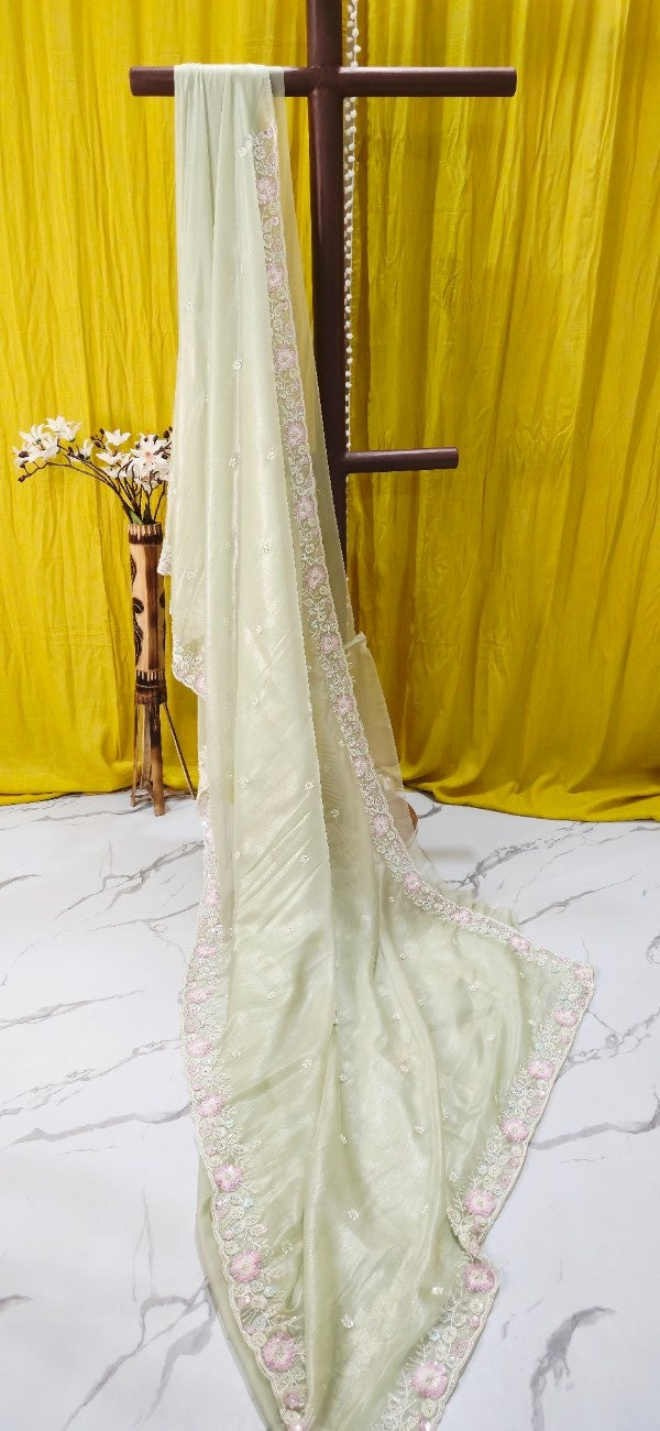Pastel Mint Net Party Wear Saree with Sequin Buti & Pink Floral Scalloped Border