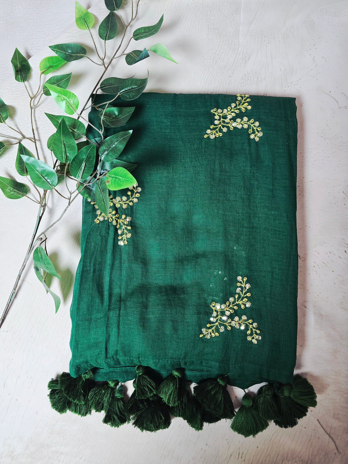 Emerald Green Mul Cotton Saree with Golden Floral Embroidery & Handcrafted Tassels