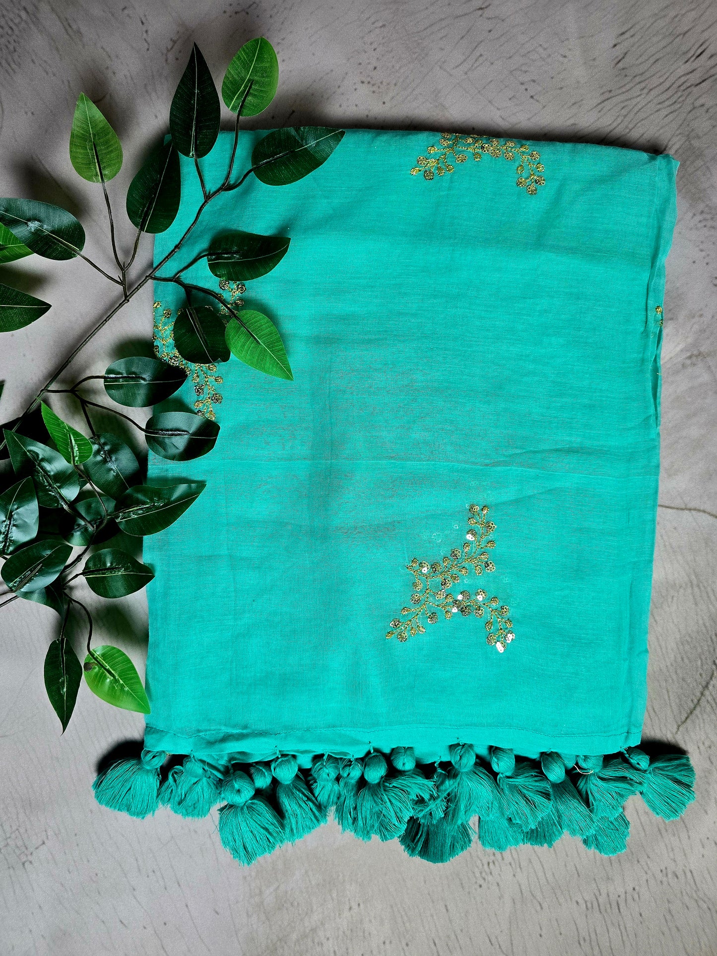 Sea Green Mul Cotton Saree with Golden Floral Embroidery & Handcrafted Tassels