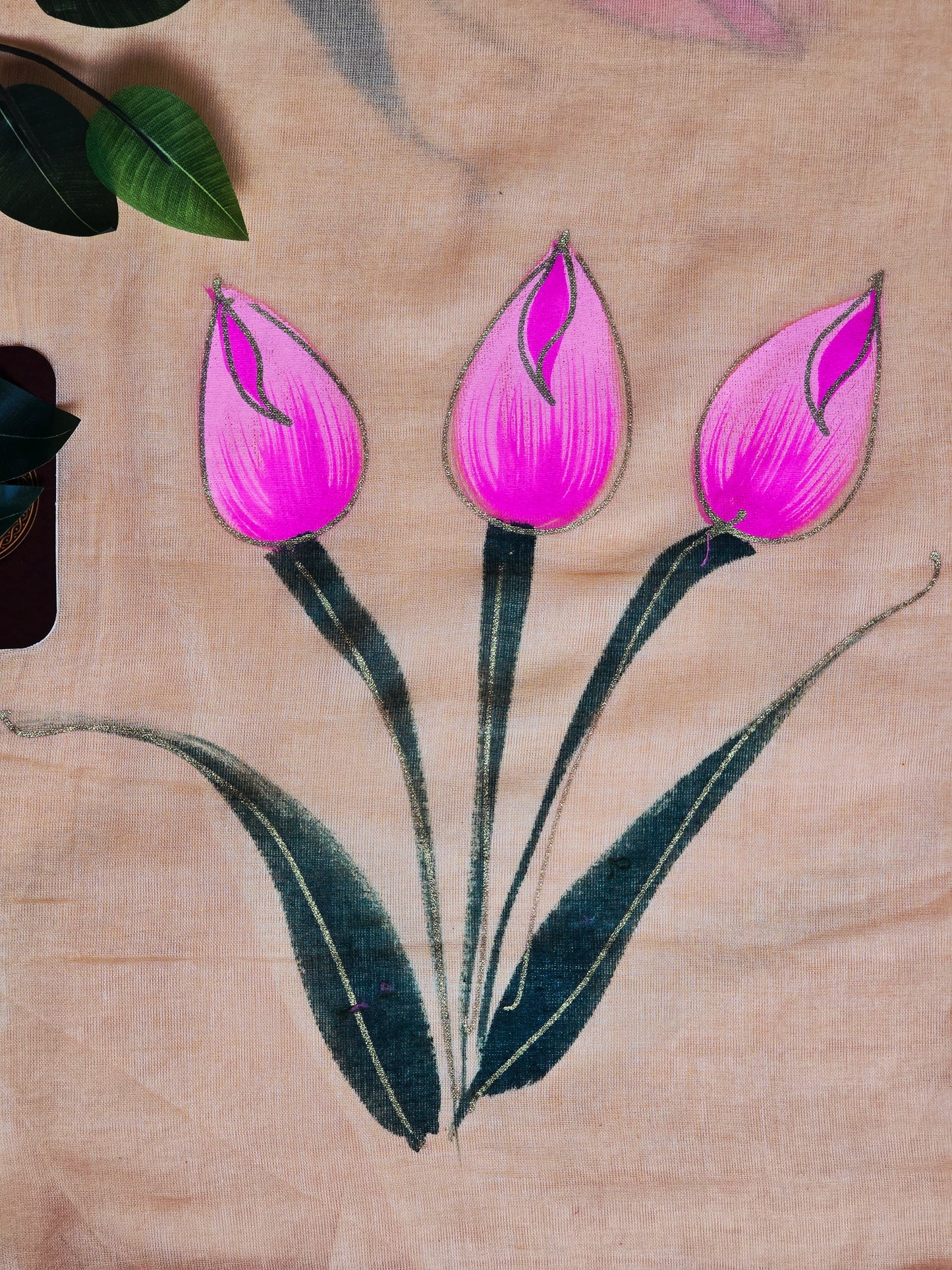 Champagne Beige Hand Painted Tulip Mul Cotton Saree with Pink & Forest Green Tassels