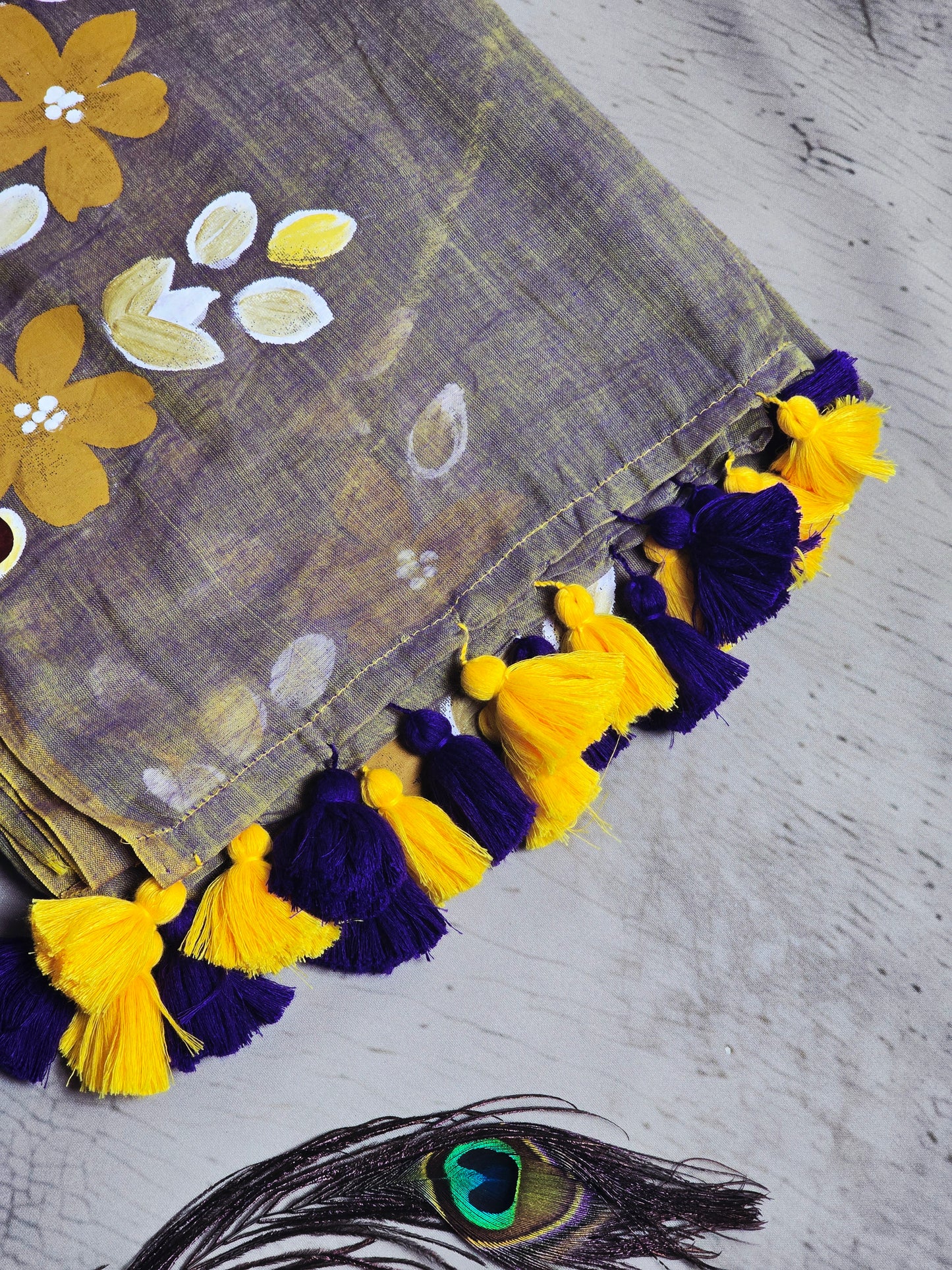 Taupe & Mustard Hand Painted Floral Mul Cotton Saree with Yellow & Royal Blue Tassels