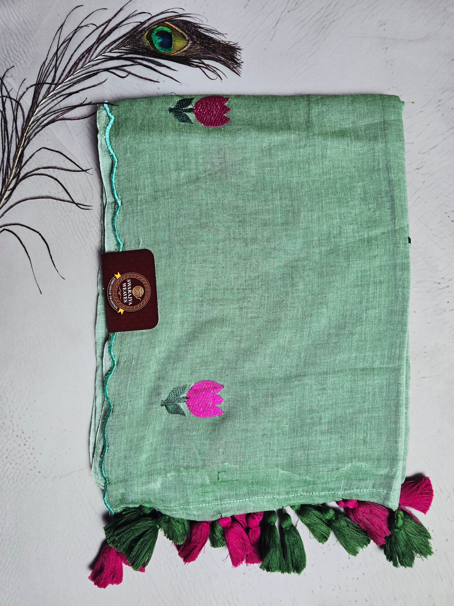 Mint Green Embroidered Tulip Mul Cotton Saree with Green & Magenta Tassels