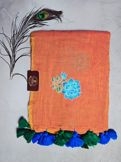 Sunset Orange Embroidered Floral Mul Cotton Saree with Royal Blue & Emerald Green Tassels