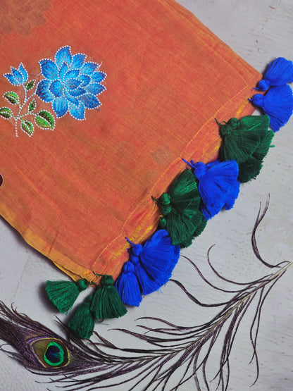 Sunset Orange Embroidered Floral Mul Cotton Saree with Royal Blue & Emerald Green Tassels