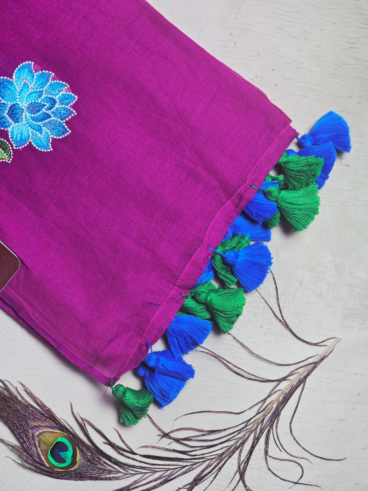 Magenta Embroidered Floral Mul Cotton Saree with Royal Blue & Emerald Green Tassels