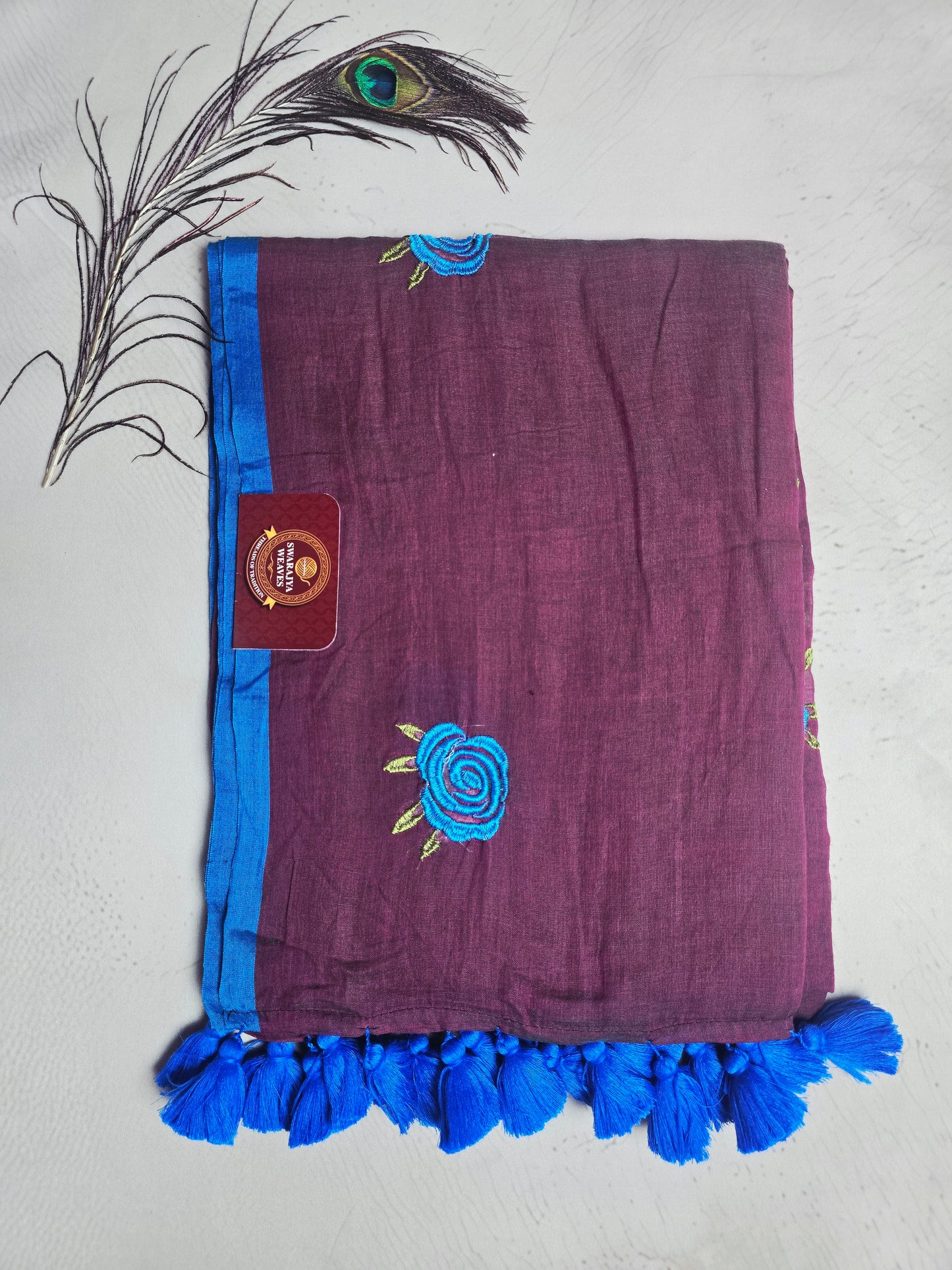 Wine Brown Embroidered Rose Mul Cotton Saree with Royal Blue Tassels