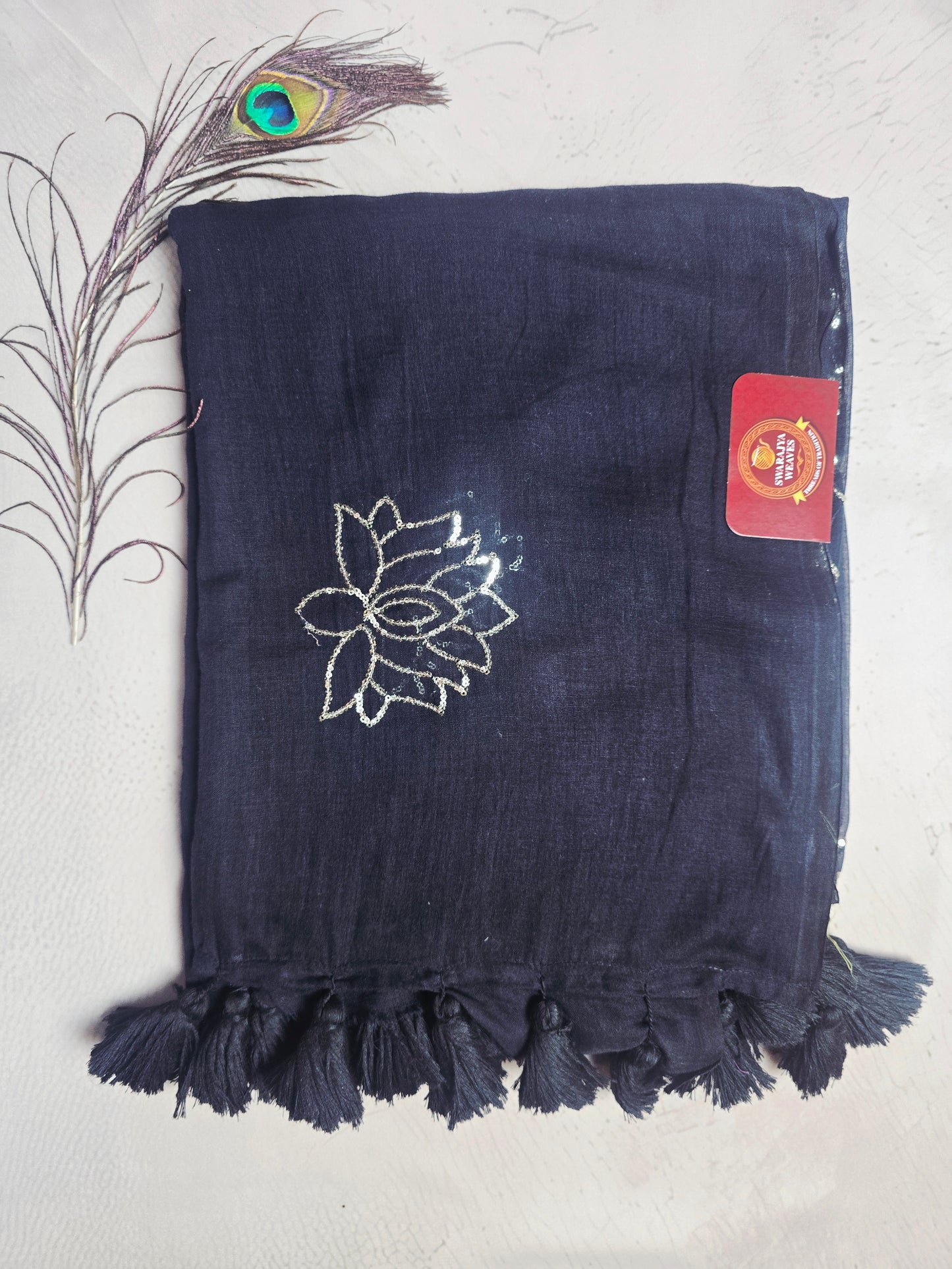 Midnight Black Mul Cotton Saree with Silver Lotus Embroidery & Handcrafted Black Tassels