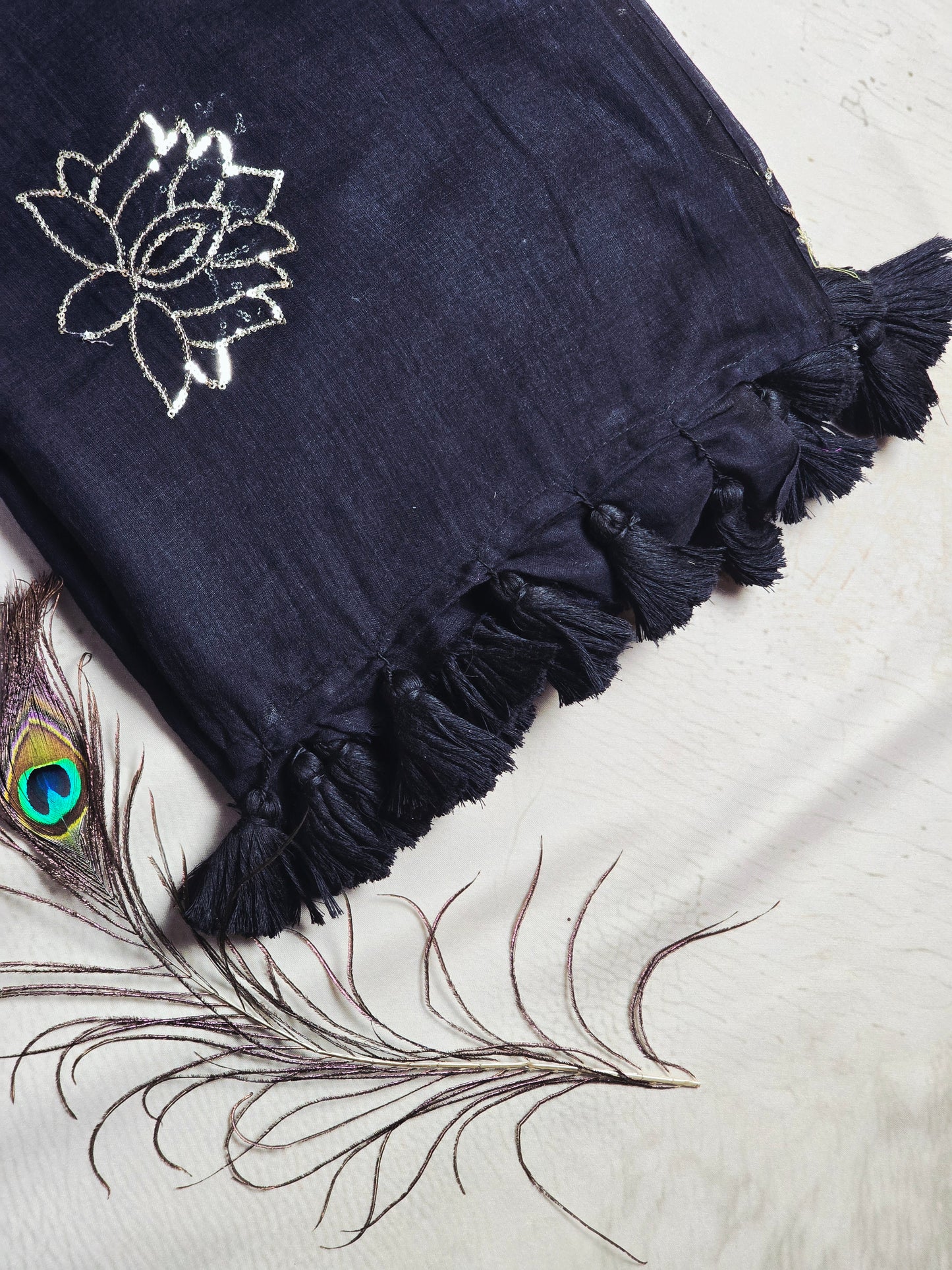 Midnight Black Mul Cotton Saree with Silver Lotus Embroidery & Handcrafted Black Tassels