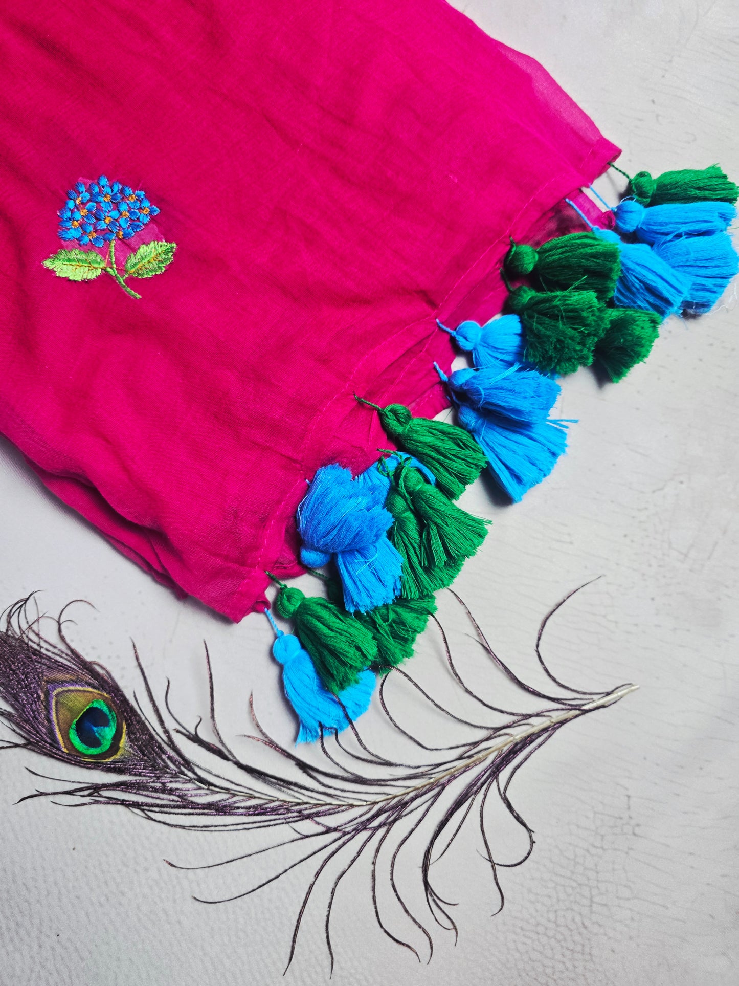 Rani Pink Mul Cotton Saree with Blue Floral Embroidery & Dual Tone Tassels