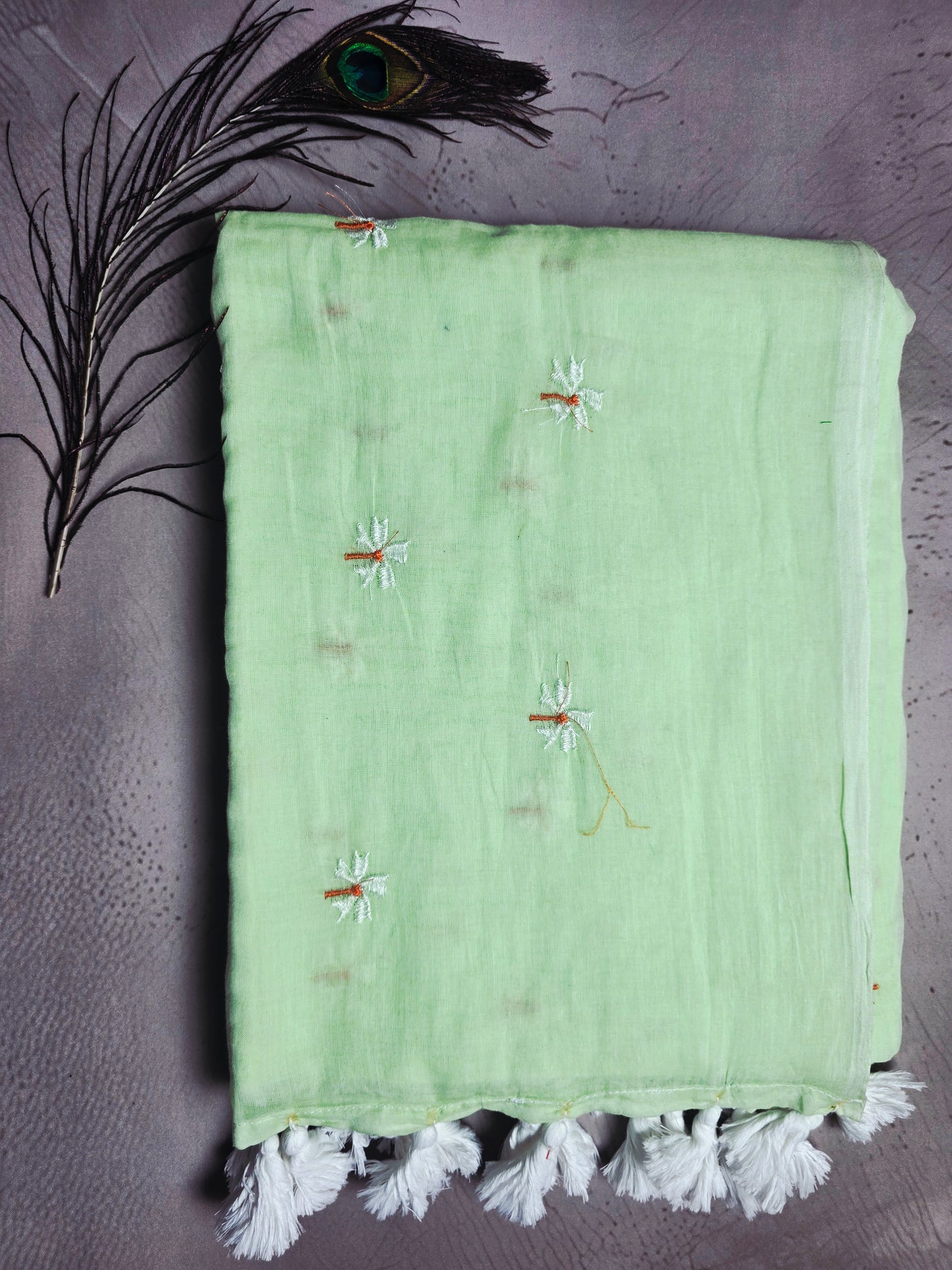 Pastel Pistachio Mul Cotton Saree with Delicate Daisy Embroidery & Handcrafted White Tassels