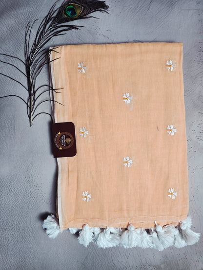 Peach Blush Mul Cotton Saree with Daisy Embroidery & Handcrafted White Tassels