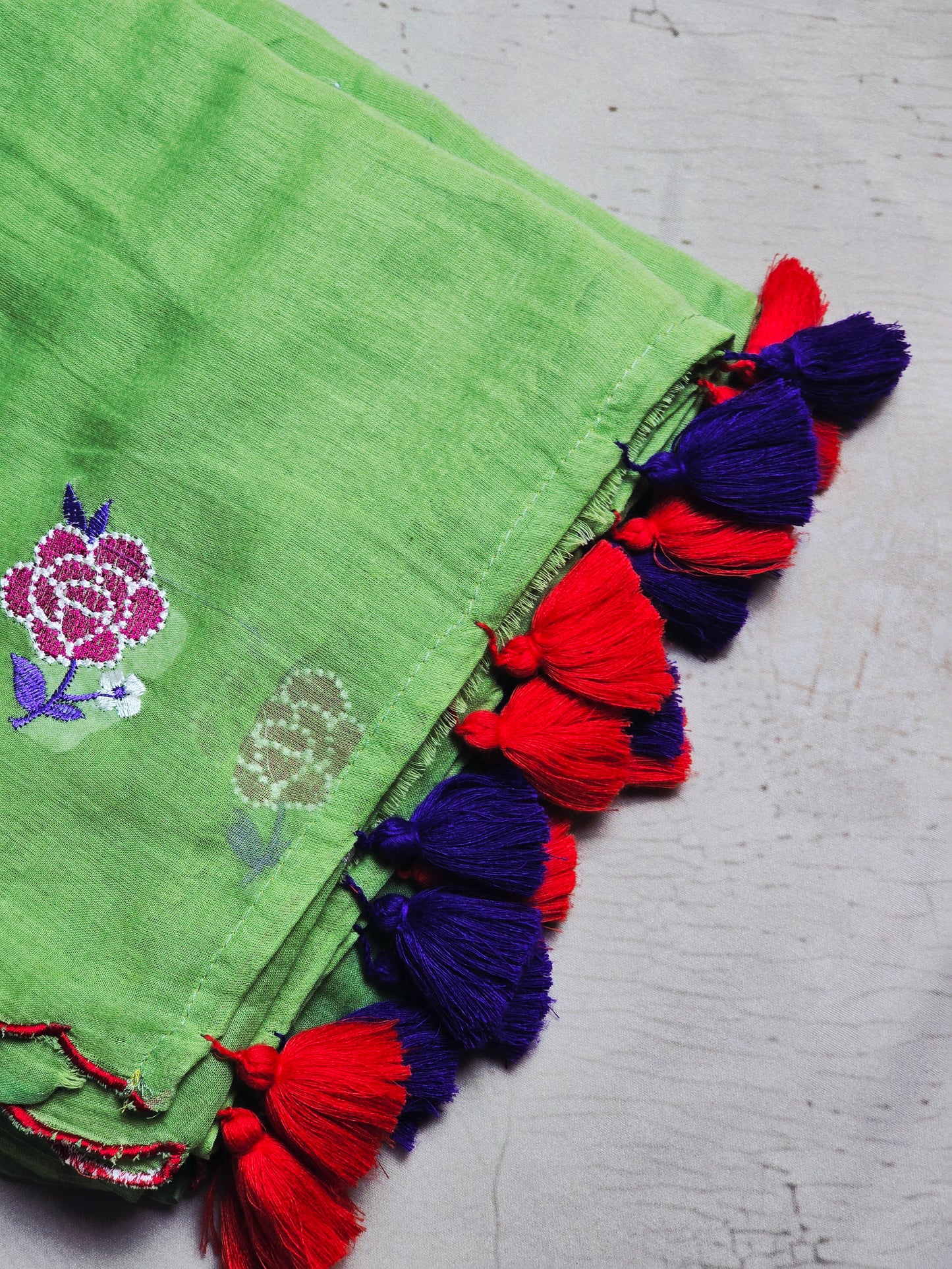 Pistachio Green Mul Cotton Saree with Rose Embroidery & Dual Tone Tassels