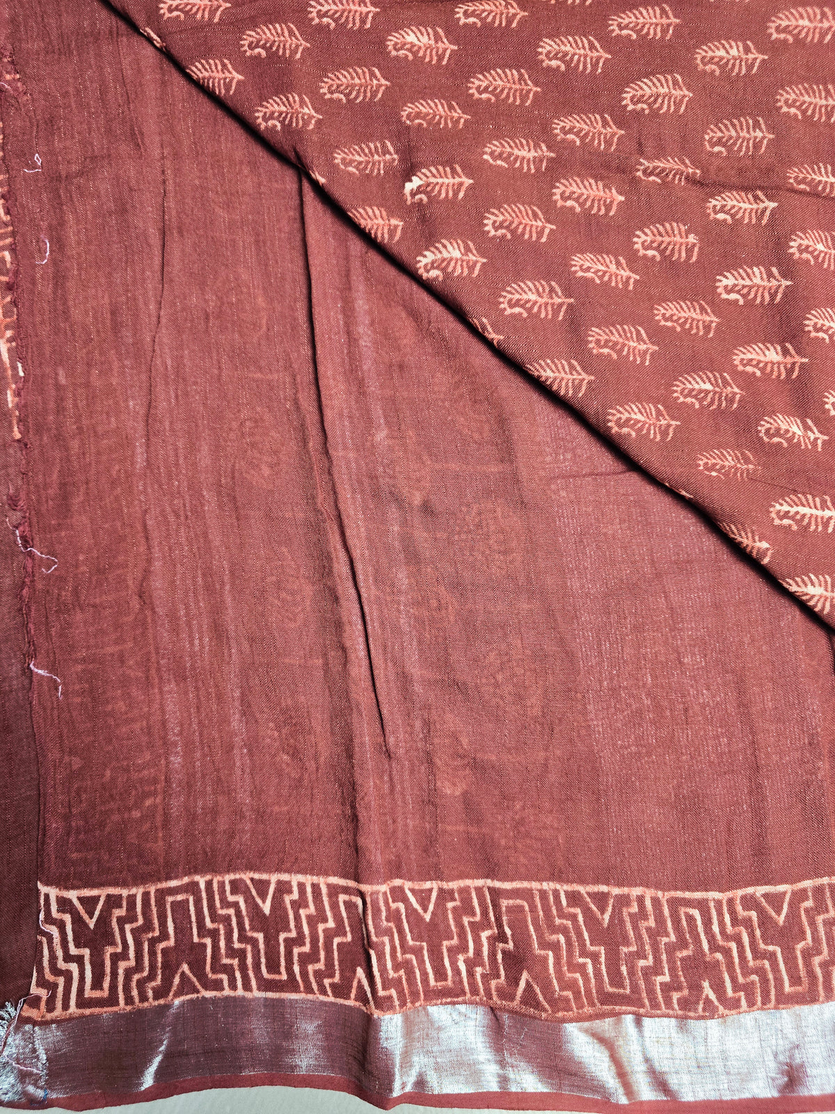 Rustwood Leaf Linen Cotton  Saree with Peach Motifs & Geometric Border