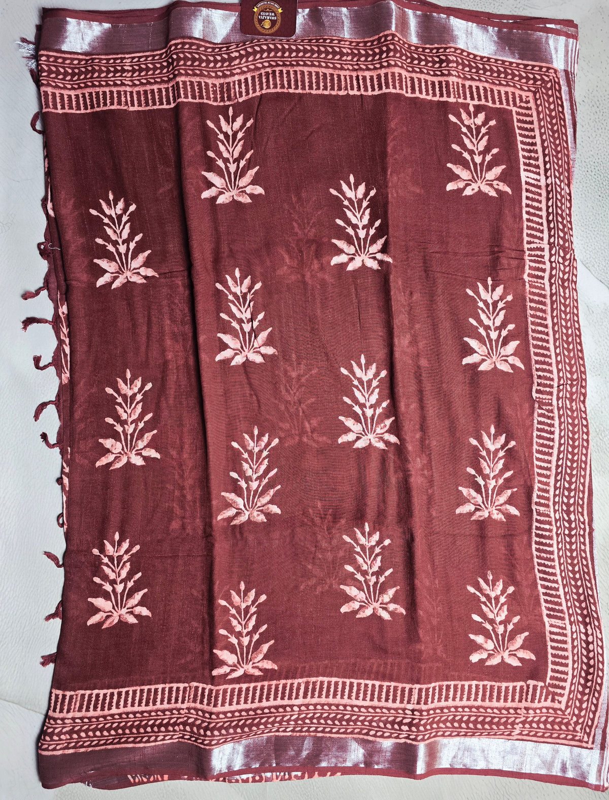 Burgundy Linen Cotton Saree with Blush Pink Botanical Motifs & Traditional Border