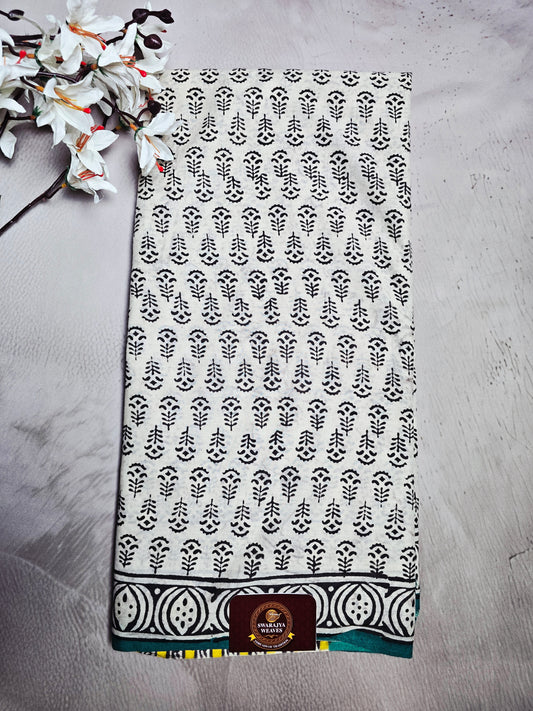 White & Black Cotton Bagru Handblock Saree with Botanical Motifs, Teal Border & Yellow Accents
