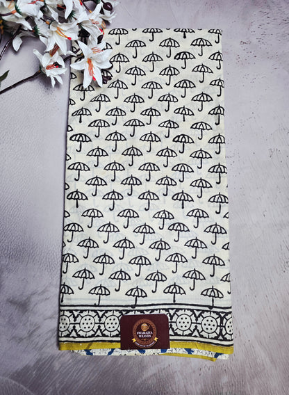 Ivory & Black Cotton Saree with Umbrella Bagru Handblocks & Blue Floral Pallu