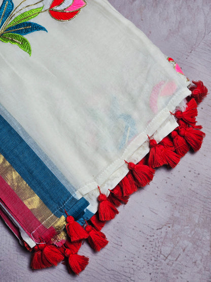 Ivory and Blue Mul Cotton Saree with Multicolour Floral Embroidery & Red Tassels