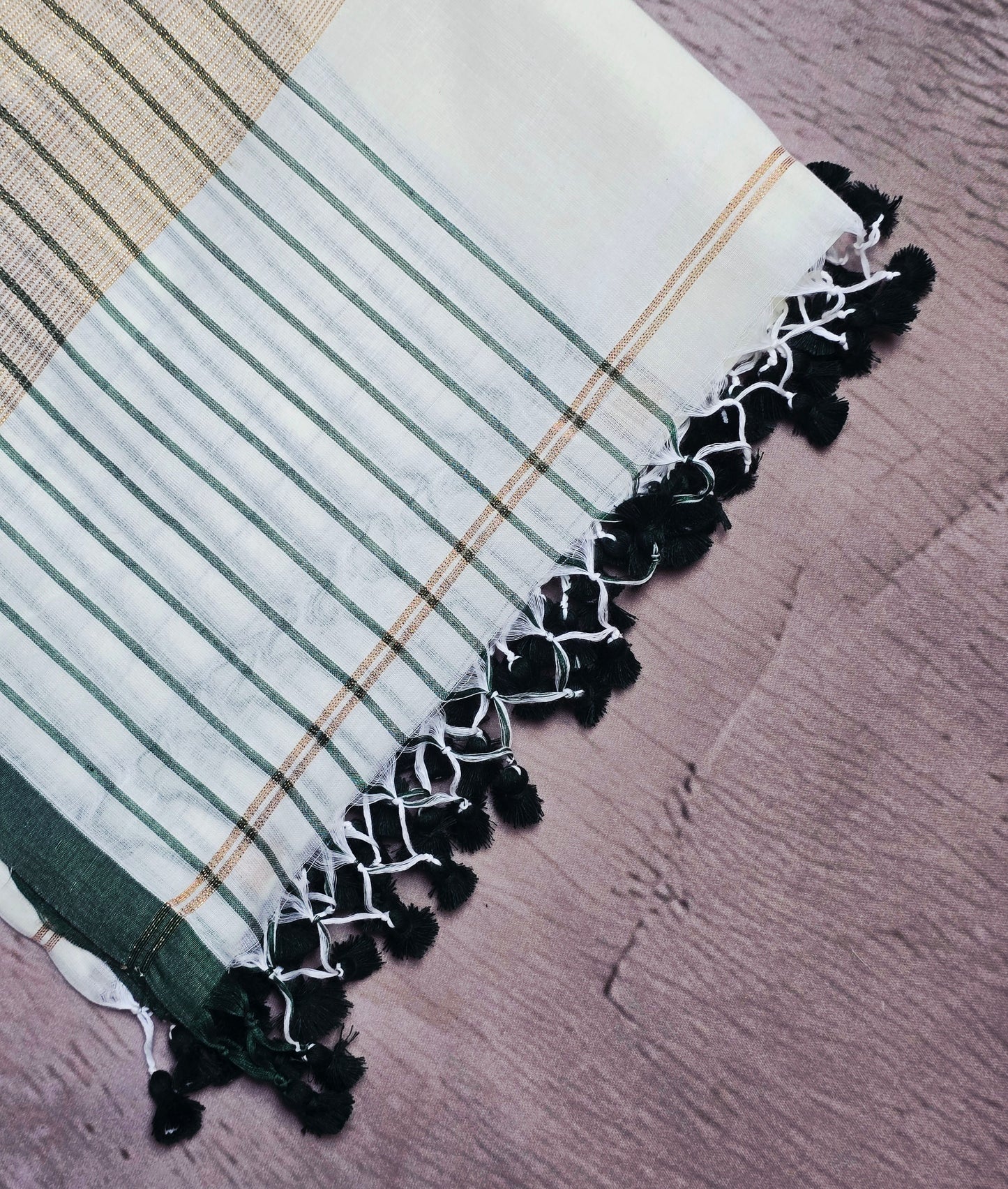 Ivory and Bottle Green Mull Cotton Saree with Gold Zari Panels & Black Tassels