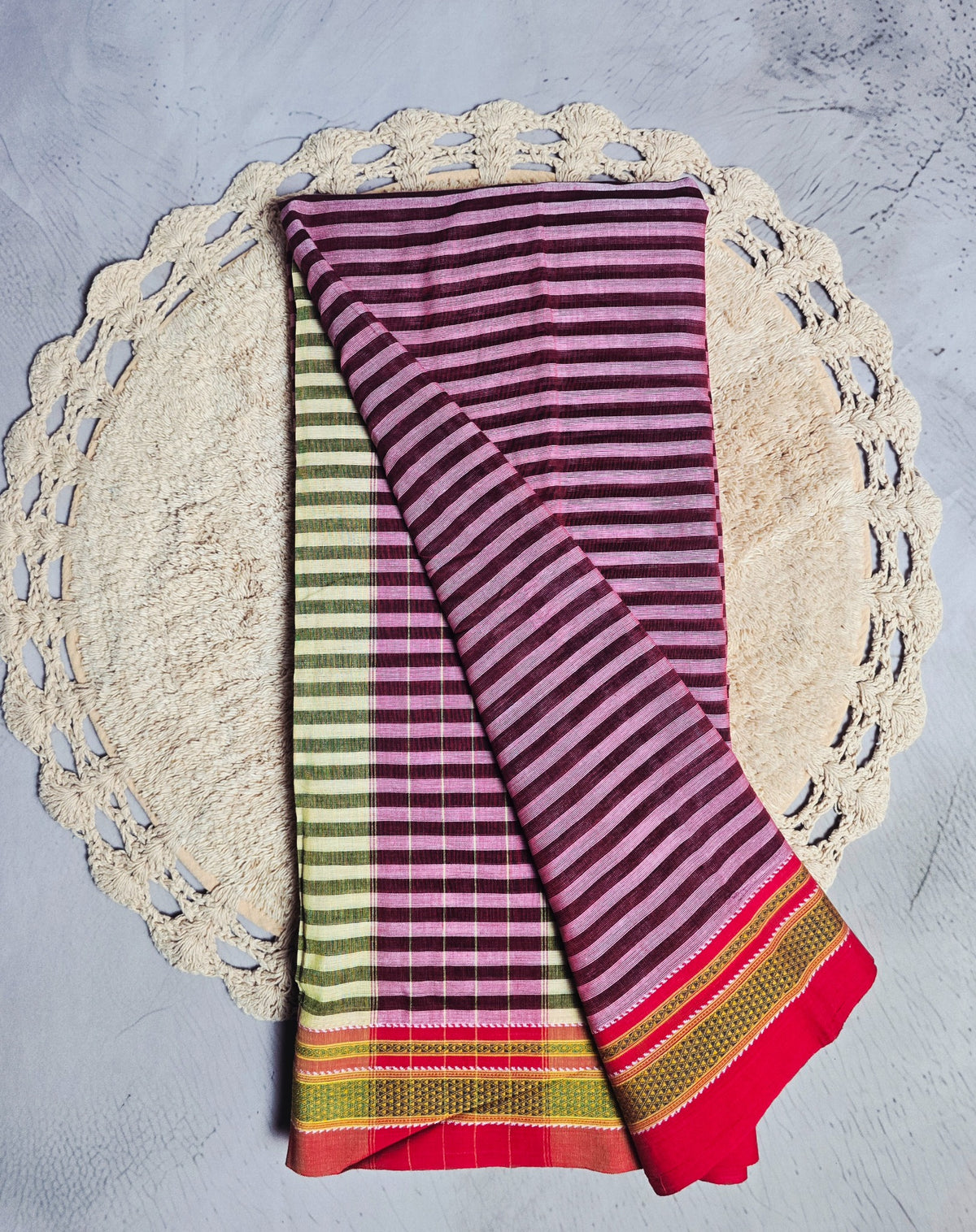 Black and peach checked Patteda Anchu Ilkal saree drape