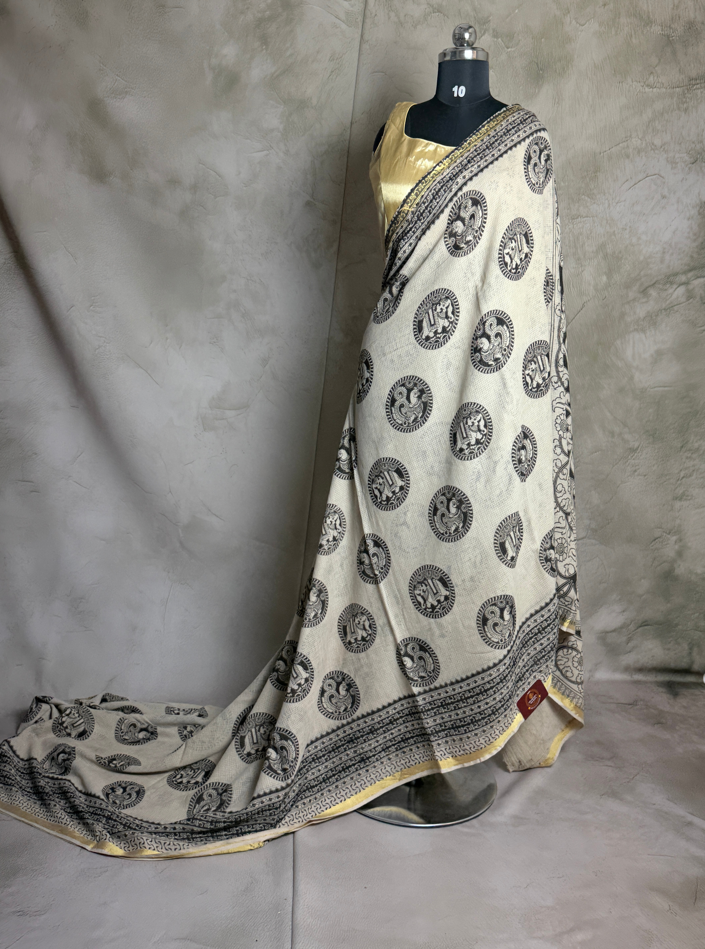 Ivory Kota Cotton Saree with Traditional Circular Motifs & Black Ethnic Border