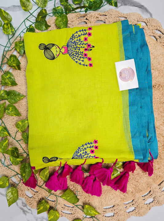 Lime Green Mul Cotton Saree with Hand-Embroidered Doll Motifs & Pink Tassels